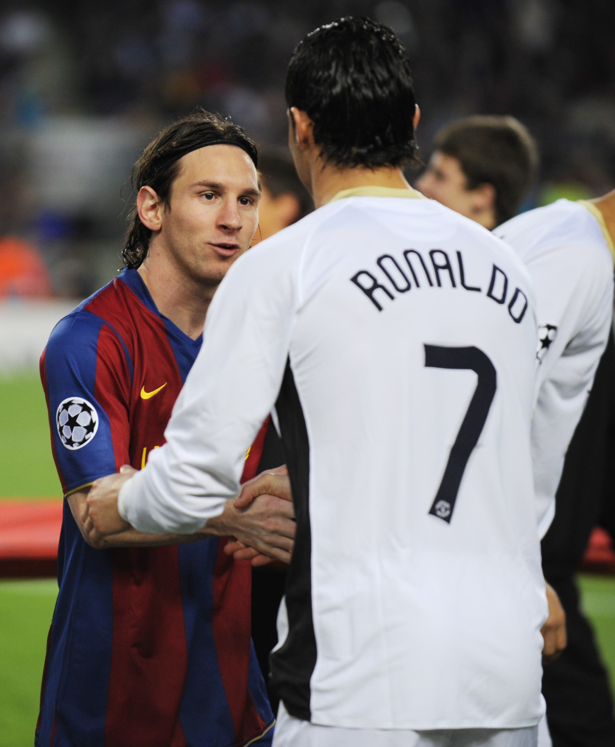 Football - FC Barcelona v Manchester United - UEFA Champions League Semi Final First Leg - The Nou Camp, Barcelona, Spain - 07/08 - 23/4/08 FC Barcelona's Lionel Messi and Manchester United's Cristiano Ronaldo shakes hands before the match Mandatory Credit: Action Images / Michael Regan