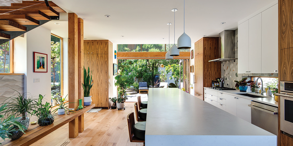 spacious kitchen that leads to an indoor-outdoor seating area