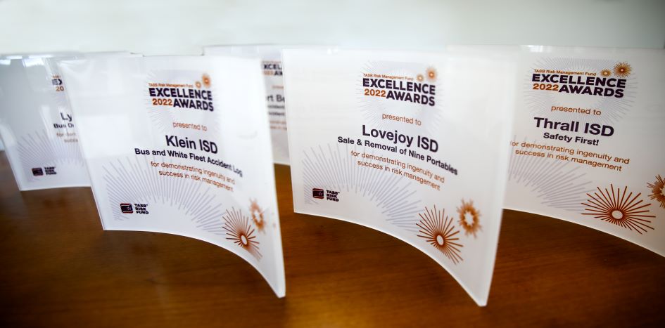 2022 Excellence Awards sit on desk