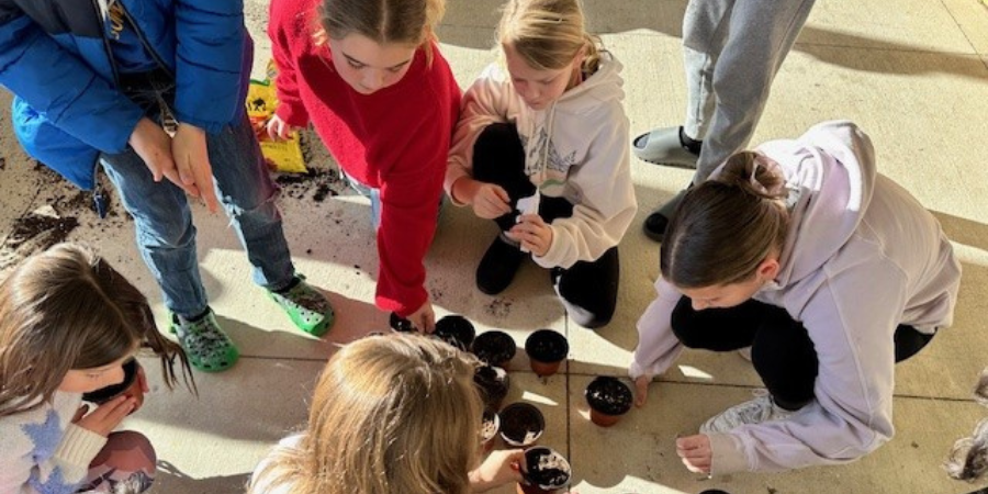 Sunnydale ISD students learning outdoors.
