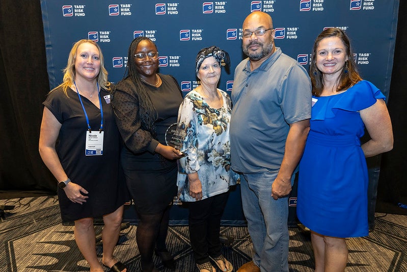 Arlington ISD representatives accept the district's Fund Excellence Award.