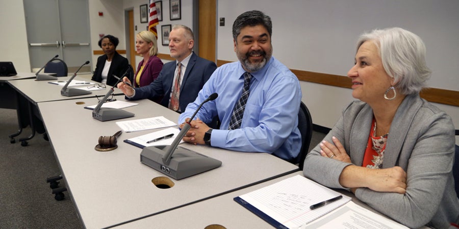 Board members at a meeting