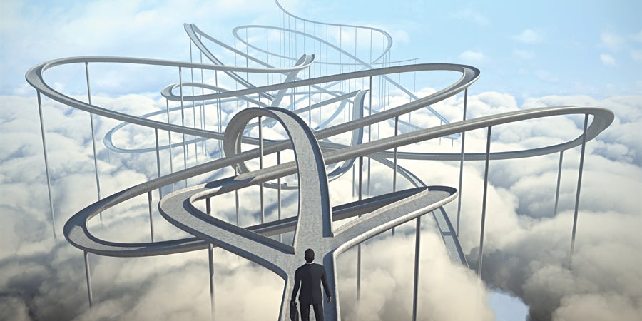 Graphic of man in suit navigating winding roads.