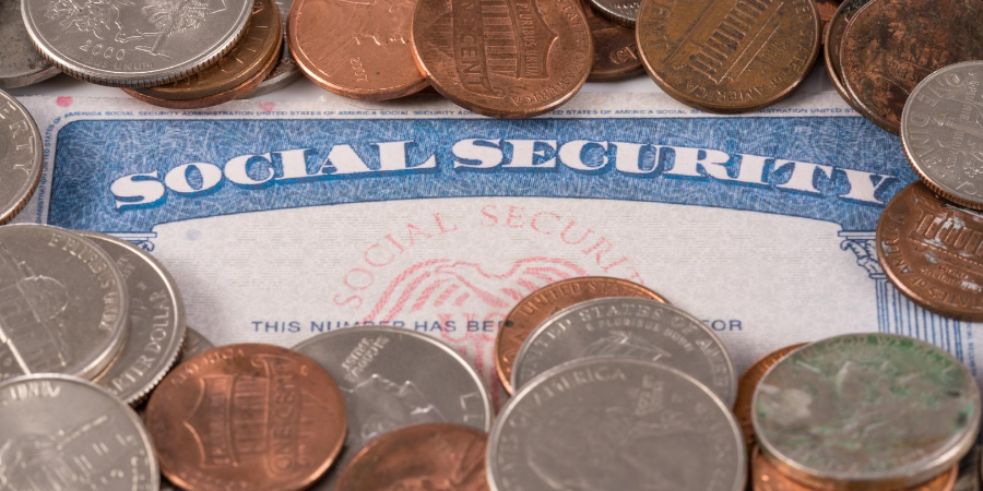 Image of a Social Security card and coins