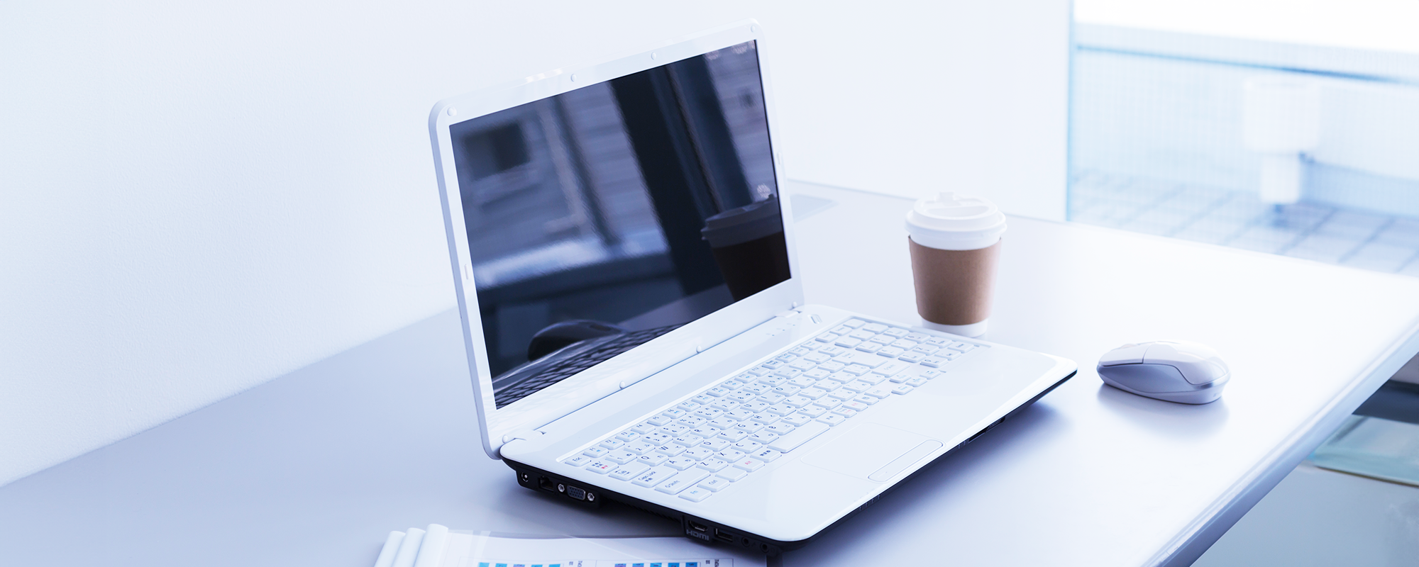 photo of an open laptop on desk (banner image)