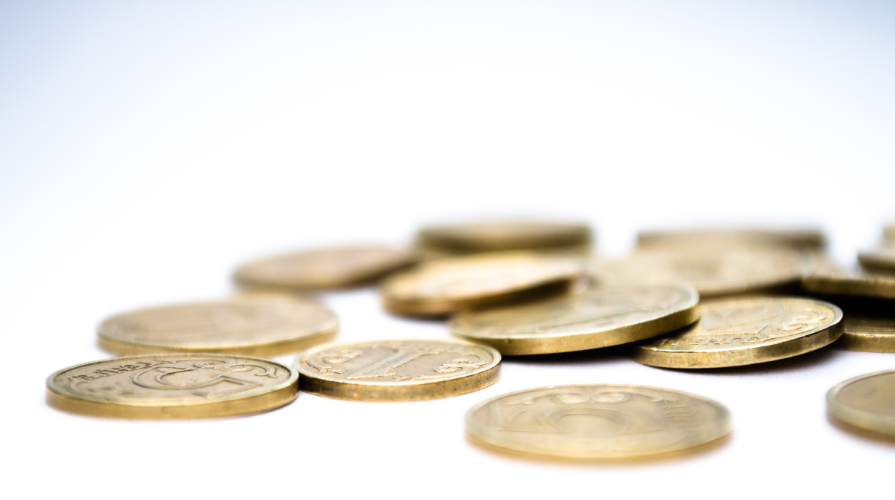 Gold coins on white background