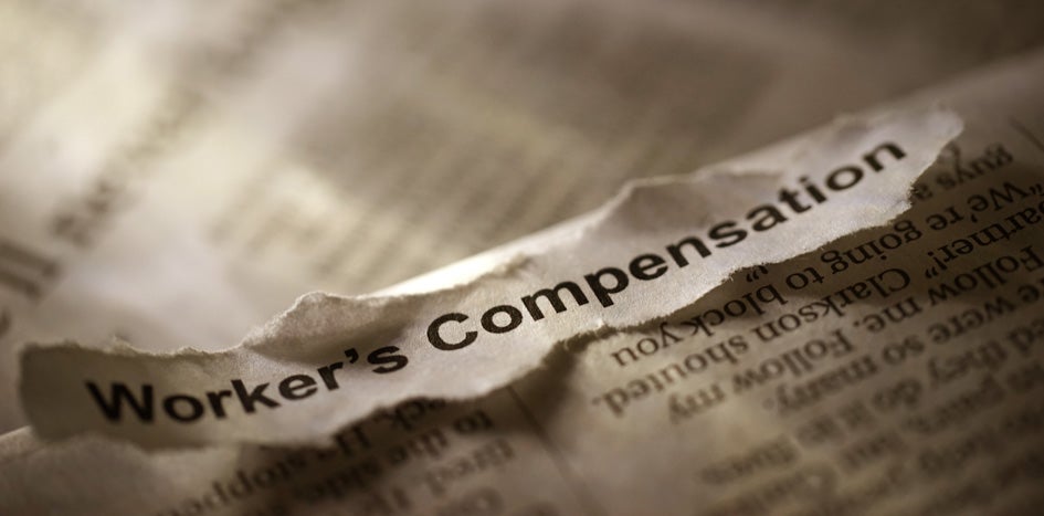 Newspaper headline reading workers' compensation