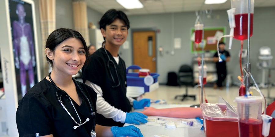 photo of two Rio Hondo ISD students learning real-life career skills through the P-TECH program