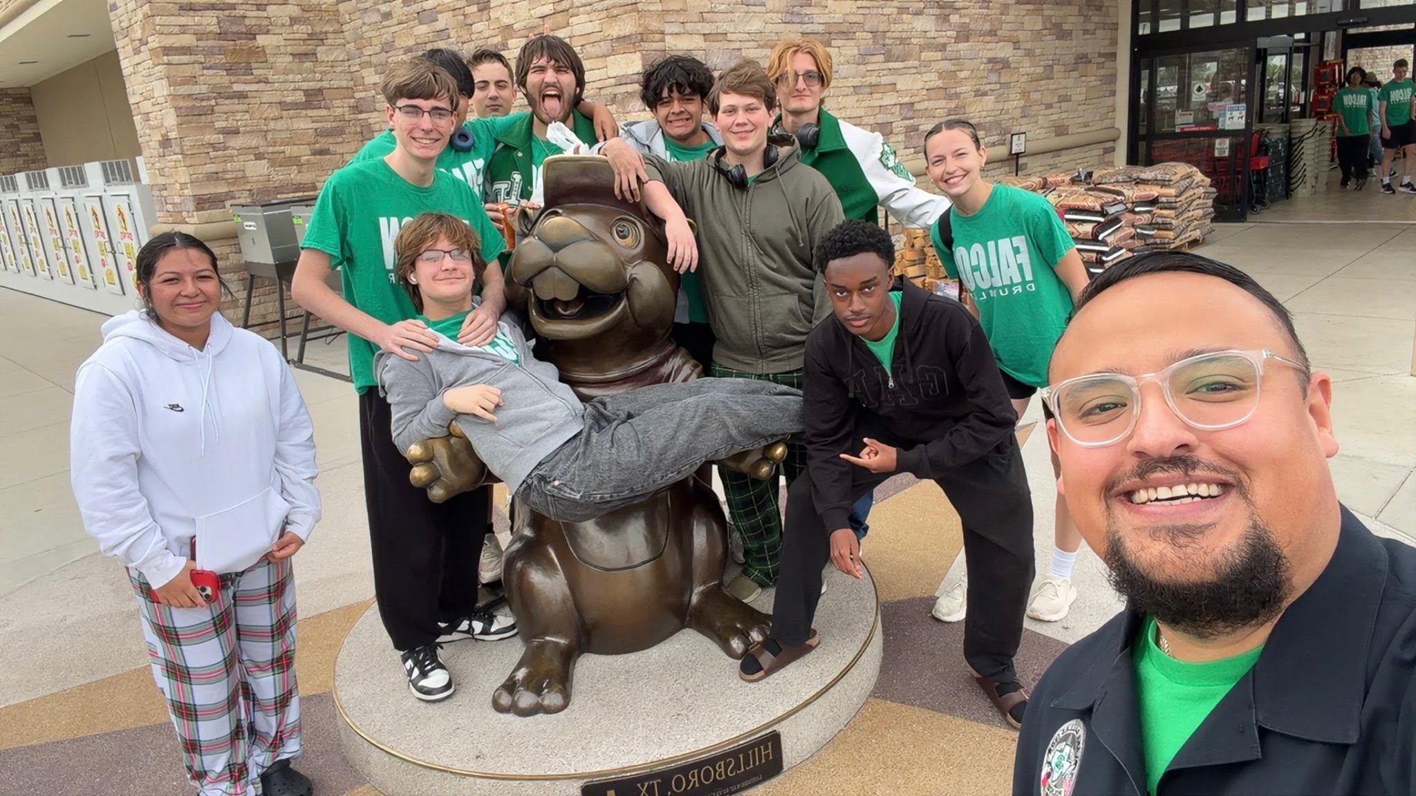 Lake Dallas Police Officer Dave Contreras smiles for a selfie with Lake Dallas High School students at Buc-ee’s. Photo courtesy of Lake Dallas ISD