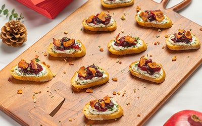 Herbed Goat Cheese, Cranberry & Bacon Crostini | Farmer John