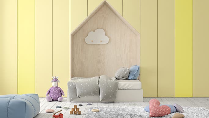 Beautiful, minimalist kids bedroom with a pale yellow wall, timber bed nook and a soft grey rug on the floor. 