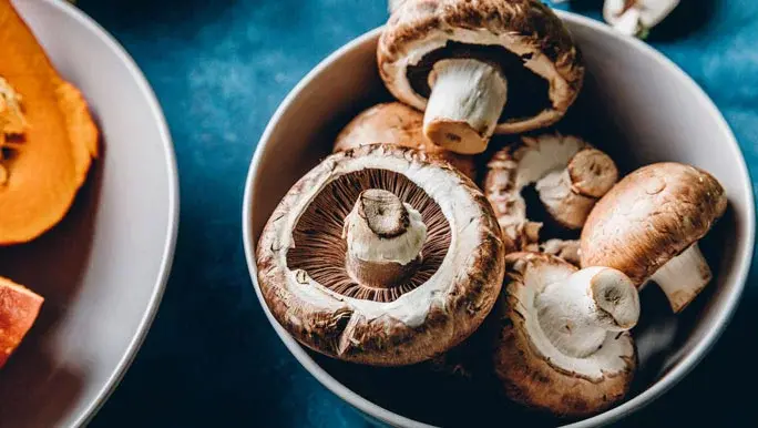A bowl of mushrooms, a source of vitamin D