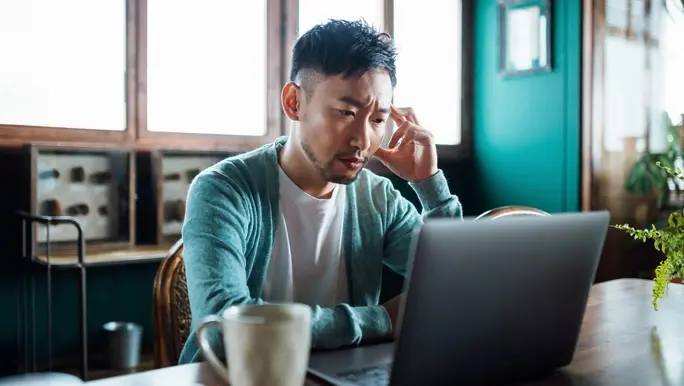 Stressed man working from home