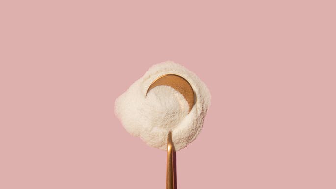 Rose gold metallic spoon with collagen powder