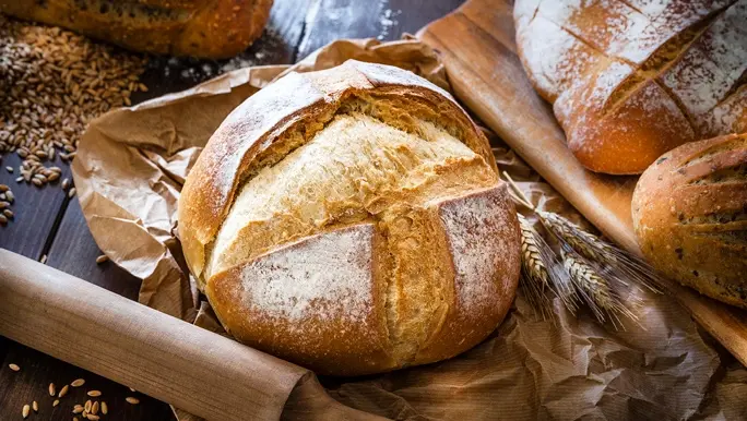 Round fresh loaf of sourdough bread