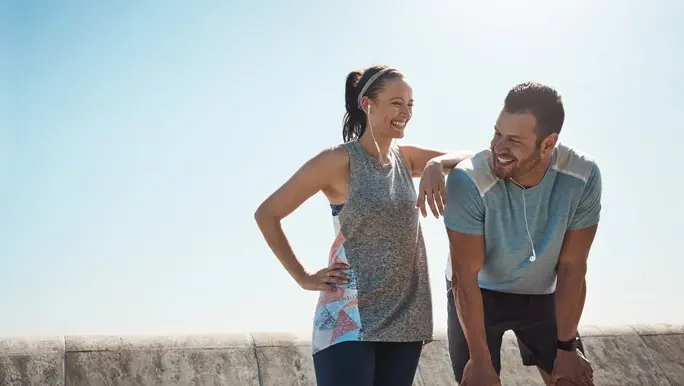 Happy couple after completing a run