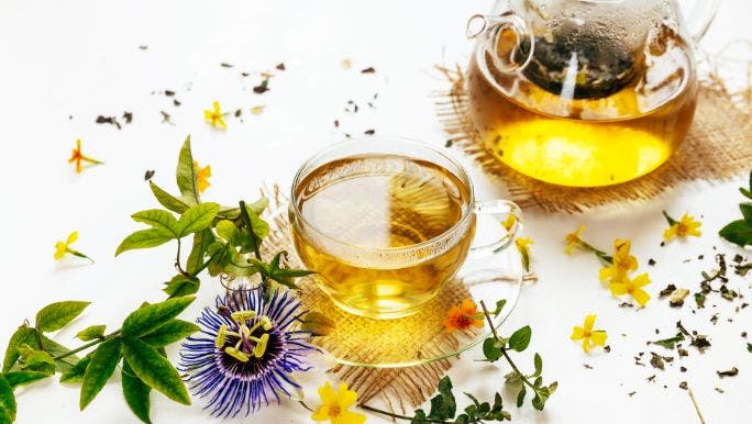 A display of passionflower herbs and herbal tea made with passionflower to help calm a racing mind