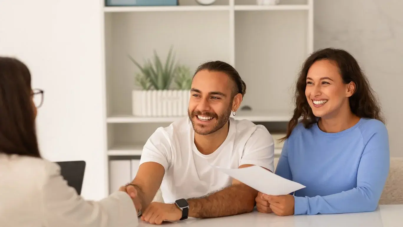 Young couple talking to their doctor about fertility