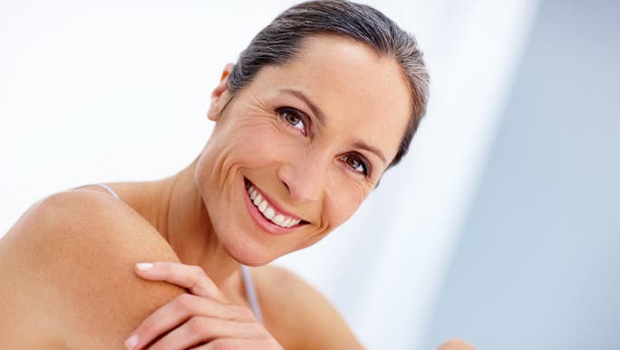 Smiling mature woman with clean fresh skin
