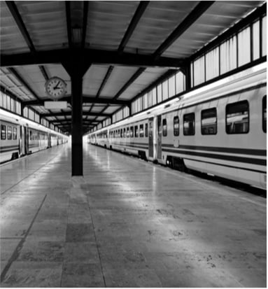 A vintage train station captured in black and white. A vintage train station captured in black and white.