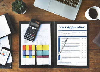 Visa application on a desk Visa application on a desk