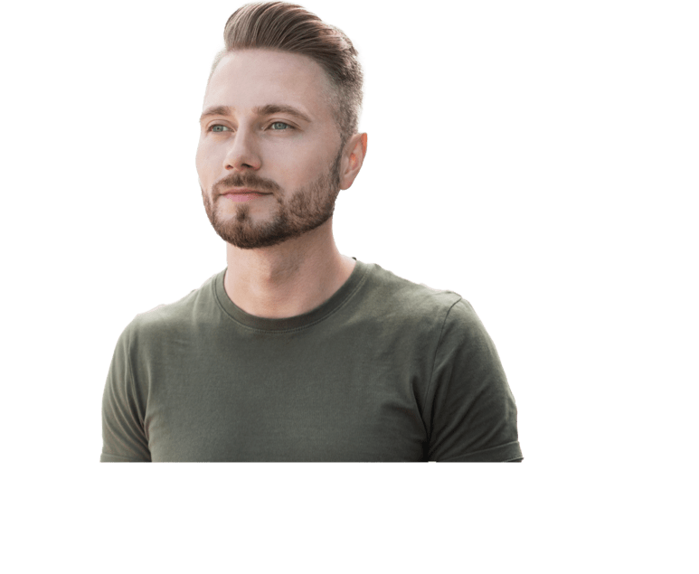 A bearded man wearing a military-green shirt.