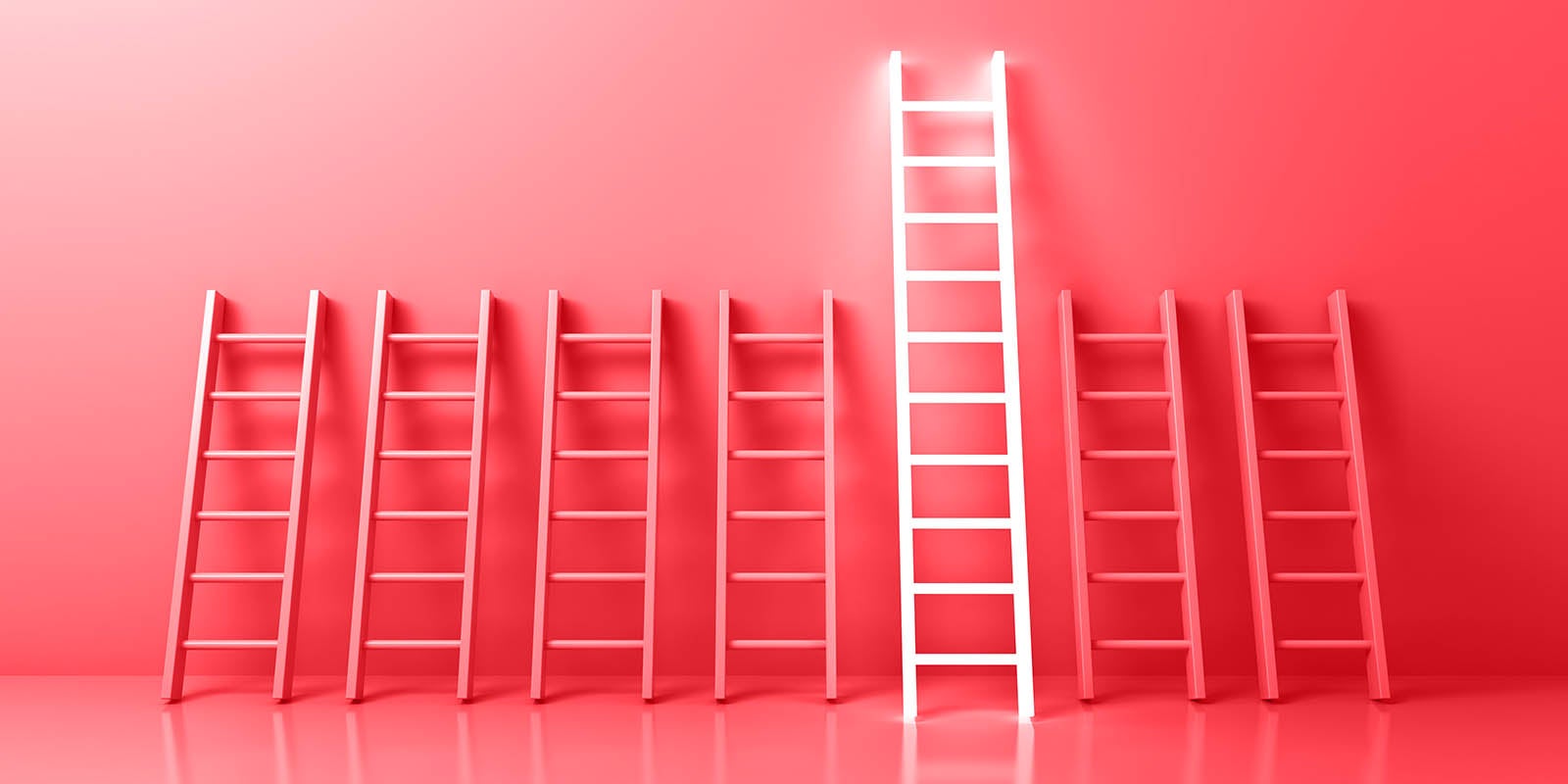 ladders, with one ladder taller than the others, symbolizing what is the difference between learning and development