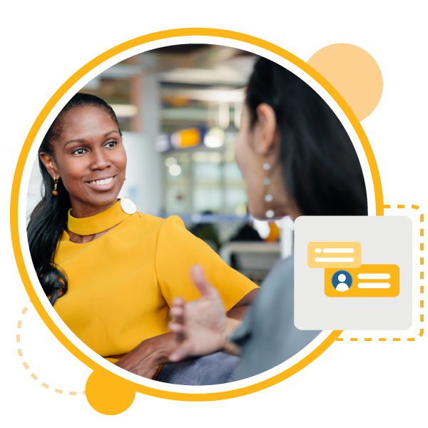 zwei berufstätige Frauen, die ein persönliches Coaching-Gespräch mit Führungskräften führen?fm=webp&q=65