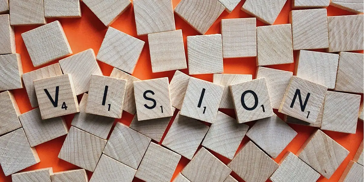 Scrabble tiles that spell the word VISION?fm=webp&q=65