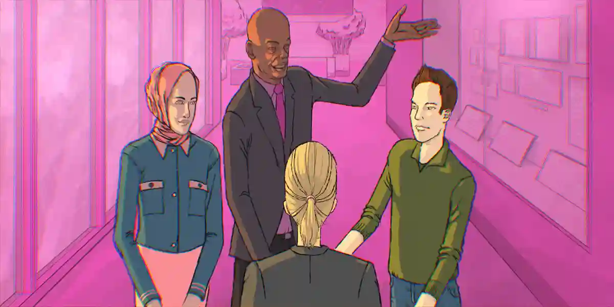 Un leader, un ami et un mentor qui fait visiter le lieu de travail à un nouveau membre de l’équipe pour souligner l’importance de l’intégration