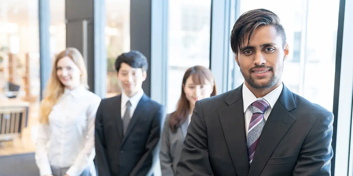 colleagues of different cultures?fm=webp&q=65