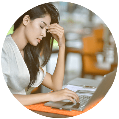 a stressed woman using a laptop?fm=webp&q=65