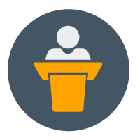 person standing behind podium to symbolize instructor-led training, which is one of the best leadership training types