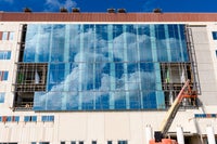 Clouds reflecting off of the building