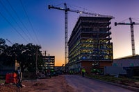 A view of building with the sunrise