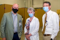 Scott Raynes, Cynde Gamache and Dr. Glisson wearing masks posing for picture.