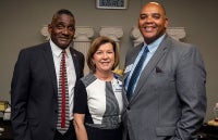 Team members pose for picture during new Baptist Hospital announcement.