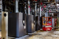 View of AC machines in building.