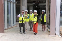 John Porter Leads FHA President Mayhew campus tour