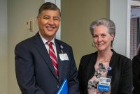 Team members pose for picture at Baptist Hospital announcement.