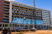 Glass being added to the building