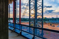 Crane with sun setting in background