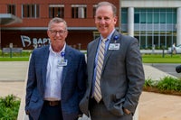 Cornerstone Ceremony -- Construction Services Vice President John Porter and President-CEO Mark Faulkner