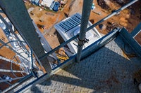 Overhead view of construction from metal platform.