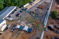 Overhead view of construction crew gathering together.
