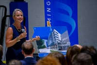 Jennifer Grove Vice President External Affairs Baptist Health Care speaking at leadership forum about new Baptist Hospital Campus