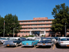 Baptist Hospital front entrance with snazzy cars.