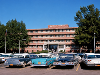 Baptist Hospital front entrance with snazzy cars.