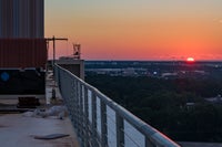 Sunrise from helo pad area on roof of Baptist Hospital