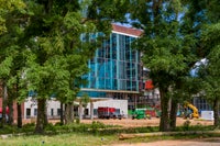 Image of Baptist campus through trees.